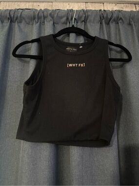 White Fox Ribbed Cropped Tank Top
Size Medium